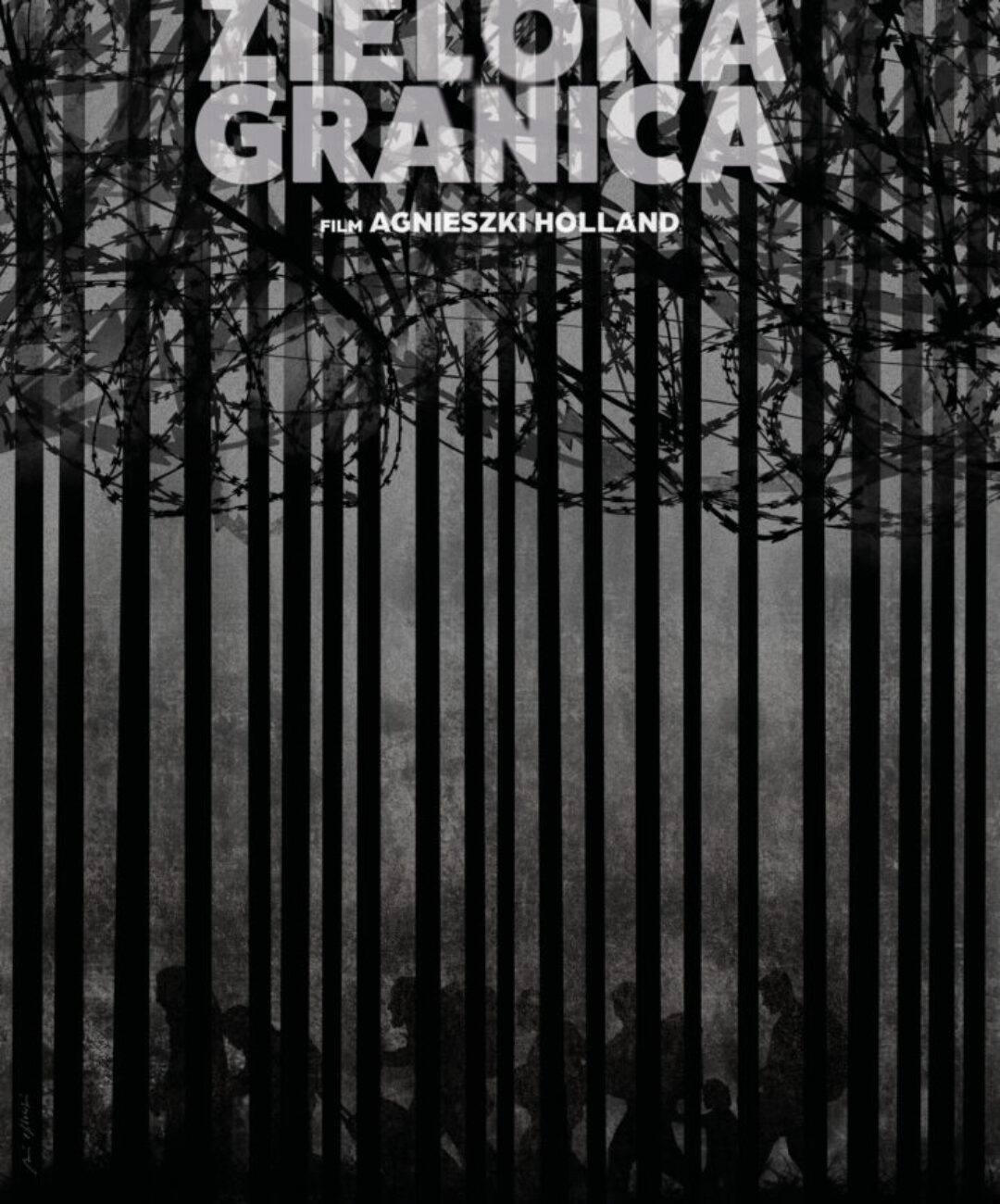 Andrzej Pągowski z plakatem do filmu „Zielona Granica”